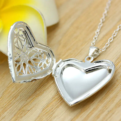 Heart-Shaped Necklace with Hollow Photo Locket Design